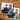 To save the date-kort med bilder av to menn med armene om hverandre ligger på et trebord